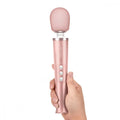 Rose gold iconic le wand petite wand massager with smooth rounded head and three buttons for rumbly vibrations