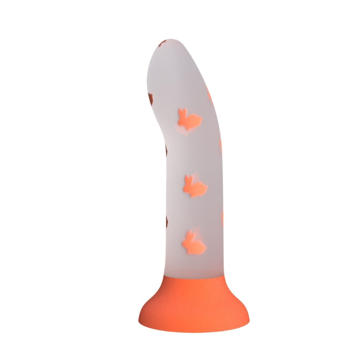 Luminous Bunny-Core silicone dildo with glow-in-the-dark orange base and bunny cutouts