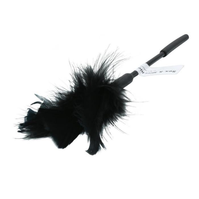 Use the Feather Tickler to outline every sensuous curve, massage every delicate corner, and explore every inch of intimacy on your lover's body - tickling unspeakable pleasure along the way with ultra-soft feathers. Add your favorite blindfold, whip, or riding crop to amp up the pleasure and senses even more!