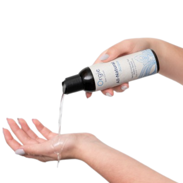 A sleek white bottle of orgie aqua all natural water based long lasting lube pours clear liquid into a hand for sensitive skin