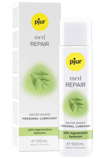 White plastic bottle of pjur med repair 100ml water-based personal lubricant with green leaf design and hyaluron label