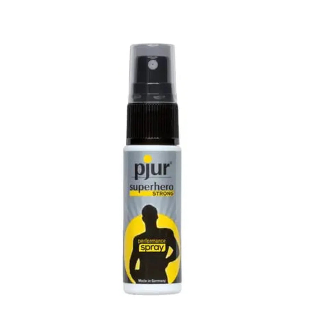 A sleek silver and black pjur superhero strong delay spray with a yellow logo reduces sensitivity and boosts performance