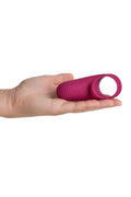 Magenta body safe silicone snugler remote cock ring with textured ribs and an open circular end for targeted vibrations