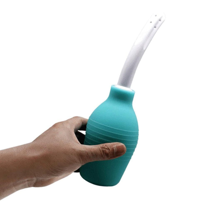 This 310ml anal douche has a multi-directional spray that cleanses your inner walls all around when you squeeze the silicone bulb. The flat-bottomed design means this douche can stand upright on its own while the flexible nozzle bends with your body to keep you comfortable as you cleanse back there.