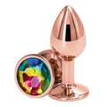 Rear Assets Rose Gold Anal Plug with Rainbow Stone Round - Small. Anal play has never been a prettier sight with this gorgeous jeweled, steel anal plug. Bulbous in form, a tapered tip ensures an easy introduction, while the broad steel bulb fills and satisfies. Perfect for anal enthusiast.