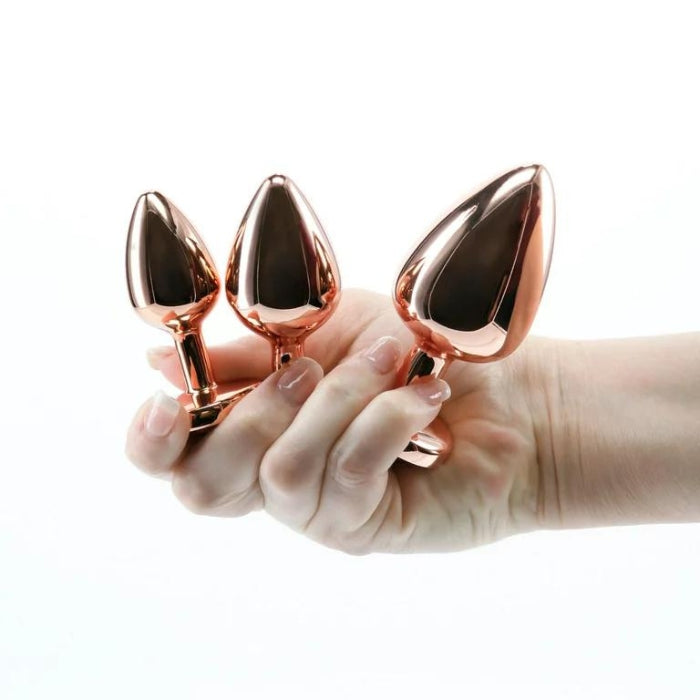 This dazzling anal trainer kit includes three chrome-plated round jewel plugs in graduated sizes, shaped for effortless penetration. Ideal for training solo or with a partner, these are body safe and available in a variety of colors, shapes, and sizes. Suitable with all lubricants.