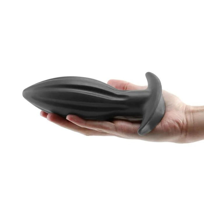 Renegade Bomba Anal Plug - Large. Made of super soft and bouncy silicone, this plug can be manipulated to fit and expand on demand. 7.36" in total length. 6.22" in insertable length. 2.36" at widest insertable point.