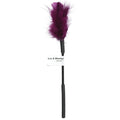 Purple feather tickler with black handle.