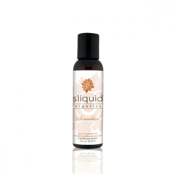 A sleek dark amber glass bottle of Sliquid Organics Sensation stimulating lubricant with black cap and orange floral logo