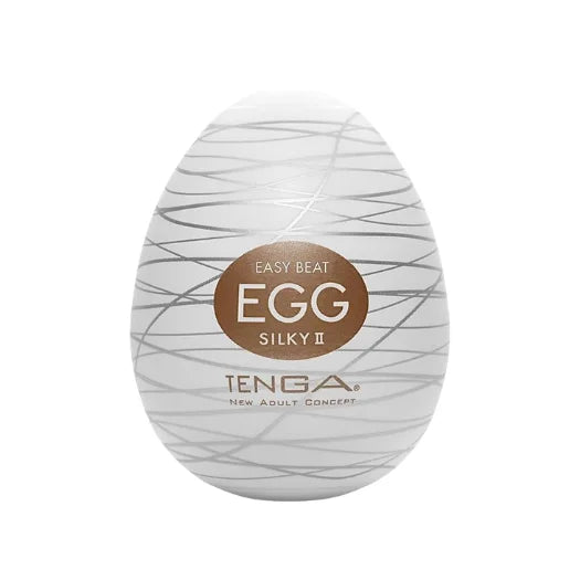 White egg-shaped tenga easy beat silky ii with silver wavy lines and body-safe elastomer silky internal texture label