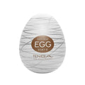 White egg-shaped tenga easy beat silky ii with silver wavy lines and body-safe elastomer silky internal texture label
