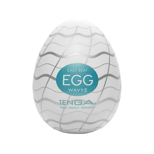 White egg-shaped tenga easy beat wavy ii made of body safe elastomer with teal branding for flowing stimulation