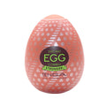 Pink tenga stronger combo featuring high impact sensation discreet egg with white geometric patterns and text