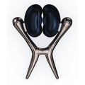 Black glossy bean-shaped vibrating nipple clamps on a sleek metallic silver stand for sensation play with vibrating units