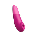 Womanizer Enhance Pink silicone toy with tapered design and rounded base