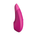Womanizer Enhance Pink silicone pleasure device with ergonomic grip