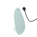 Womanizer Liberty sage clitoral sucker with mint green hearing aid and black cable