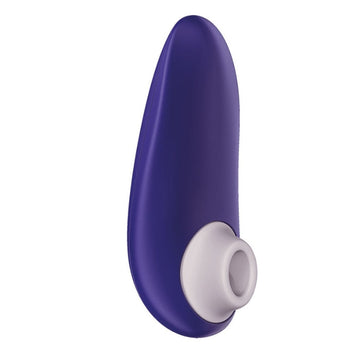Womanizer Starlet 3 indigo clitoral stimulator with purple silicone toy and white base