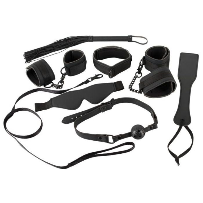A stunning advanced 7 piece set in black. This stylish set includes an eye mask, velour leather whip (total length 3cm) for pleasure or pain, velour collar with detachable leash, ball gag, ankle and handcuffs (5cm wide handcuffs with Velcro on a short chain with carabiners).
