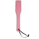 Pink paddle with black wrist band.