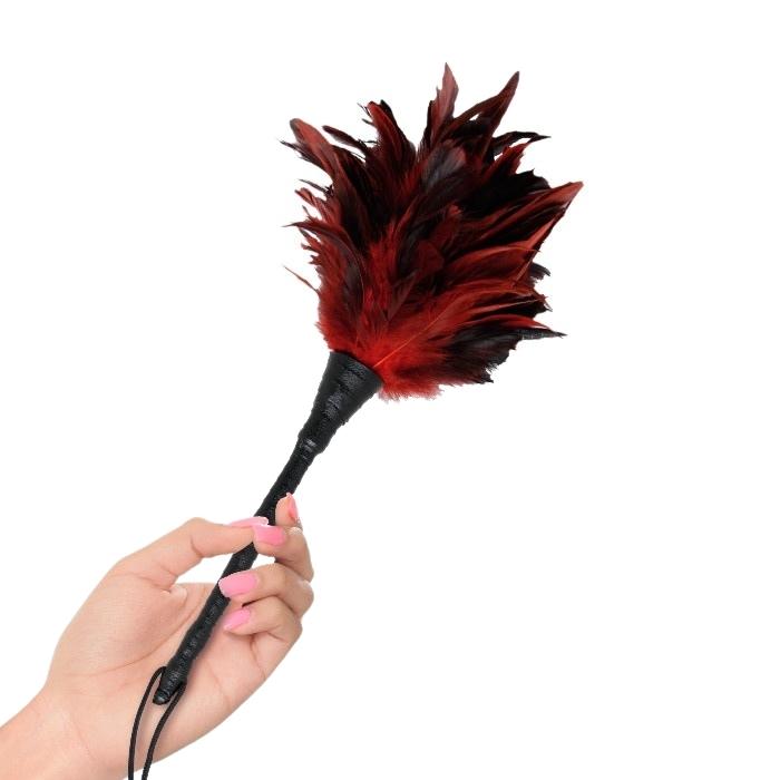 Clean and polish all the right spots with this Frisky Feather Duster from Pipedream's Fetish Fantasty line. Let the soft, seductive feathers tease, tickle and titillate you with each sexy stroke.