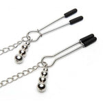 Explore the delicious combination of pleasure and pain by attaching the nipple clamps to each of your nipples, adjusting the pressure levels with the rings. The perfect accessory for enhancing your bedroom bondage play and taking your erotic excitement to another next level. Includes a satin storage bag.