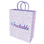 10-inch gift bag has a white background with pastel purple flocking and matching metallic stamped F-word on front and back. This suggestive bag is as fun to give as it is to receive.