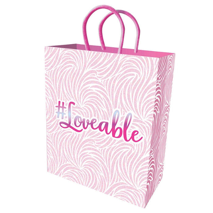 10-inch gift bag has a white background with pale pink flocking and matching metallic stamped loveable on front and back.