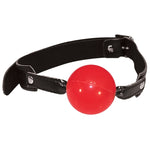 Solid adjustable racy red ball gag. The two inch ball is made from soft rubber for a comfortable fit.