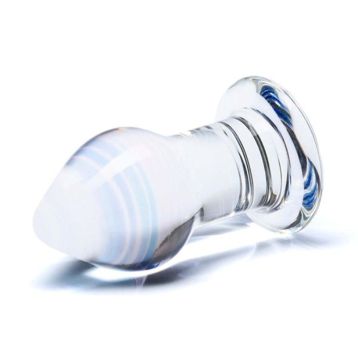 The Amethyst Rain Butt Plug is a gorgeous handcrafted, handblown, classic butt plug made from borosilicate glass. The plug is temperature responsive for sensory play. (Heat up or cool down in water).